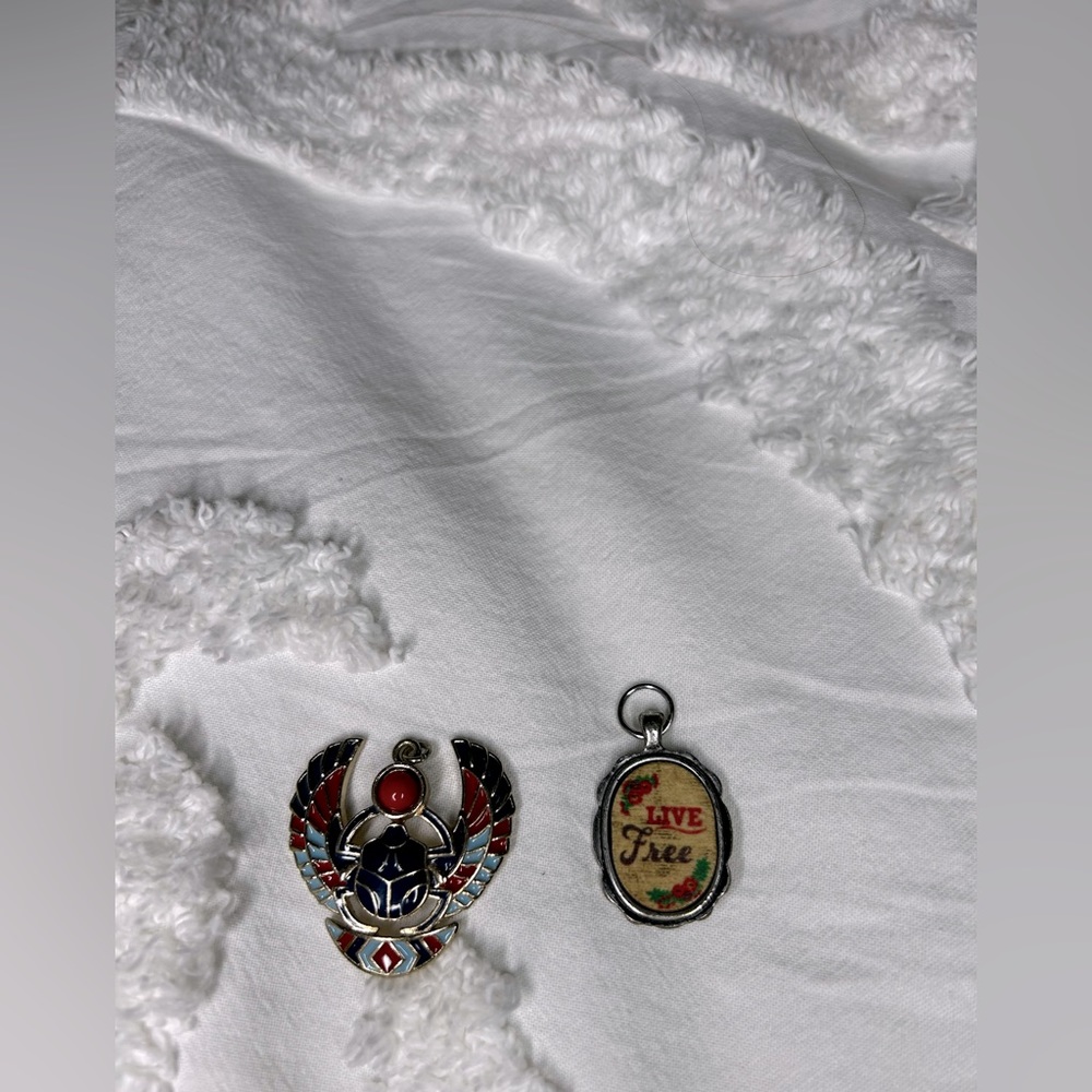 2 costume jewelry pendants
